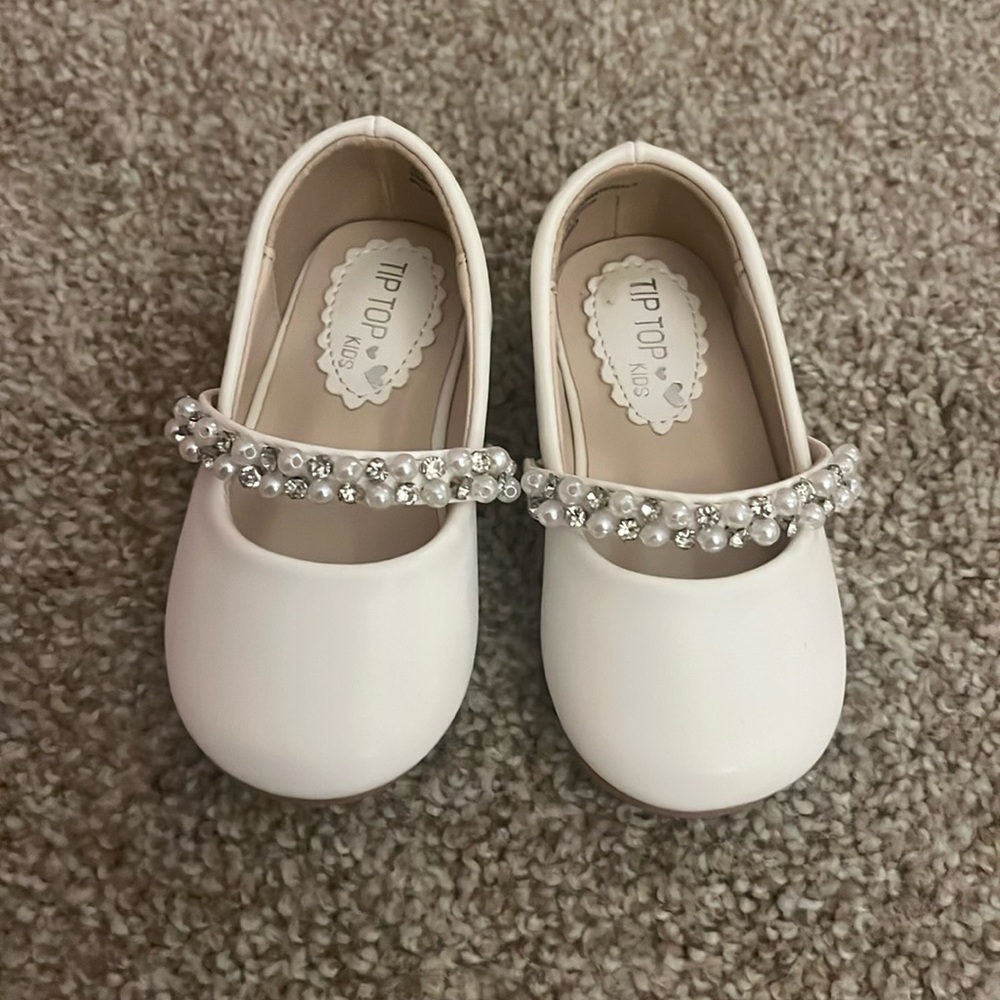 Baby girl white and pearl dress shoes.